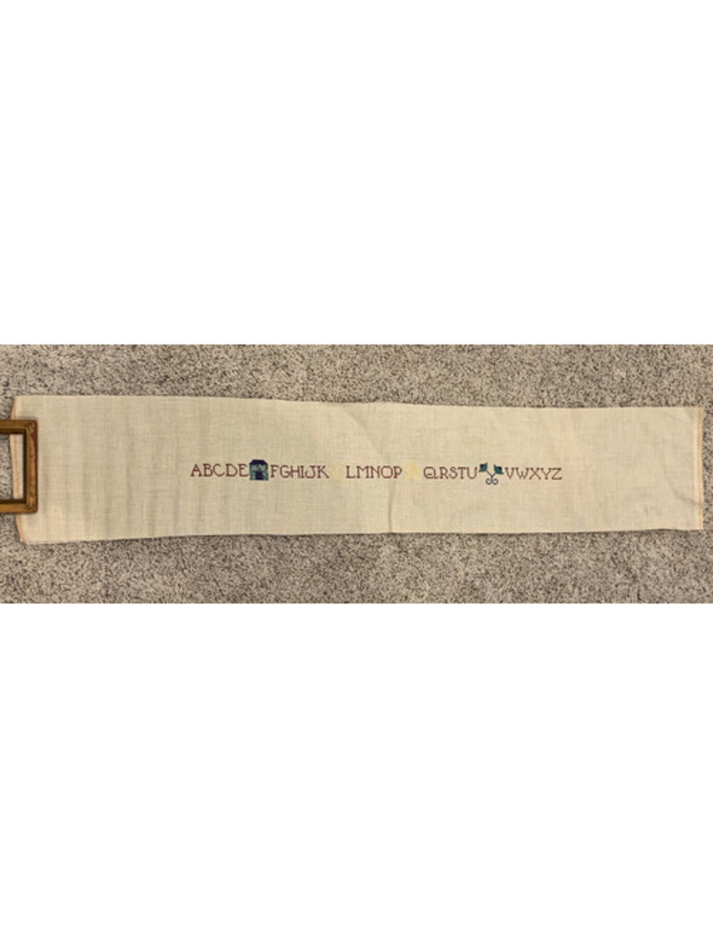 Cross Stitched Alphabet With Noon Stars Bells And House Wall Art
